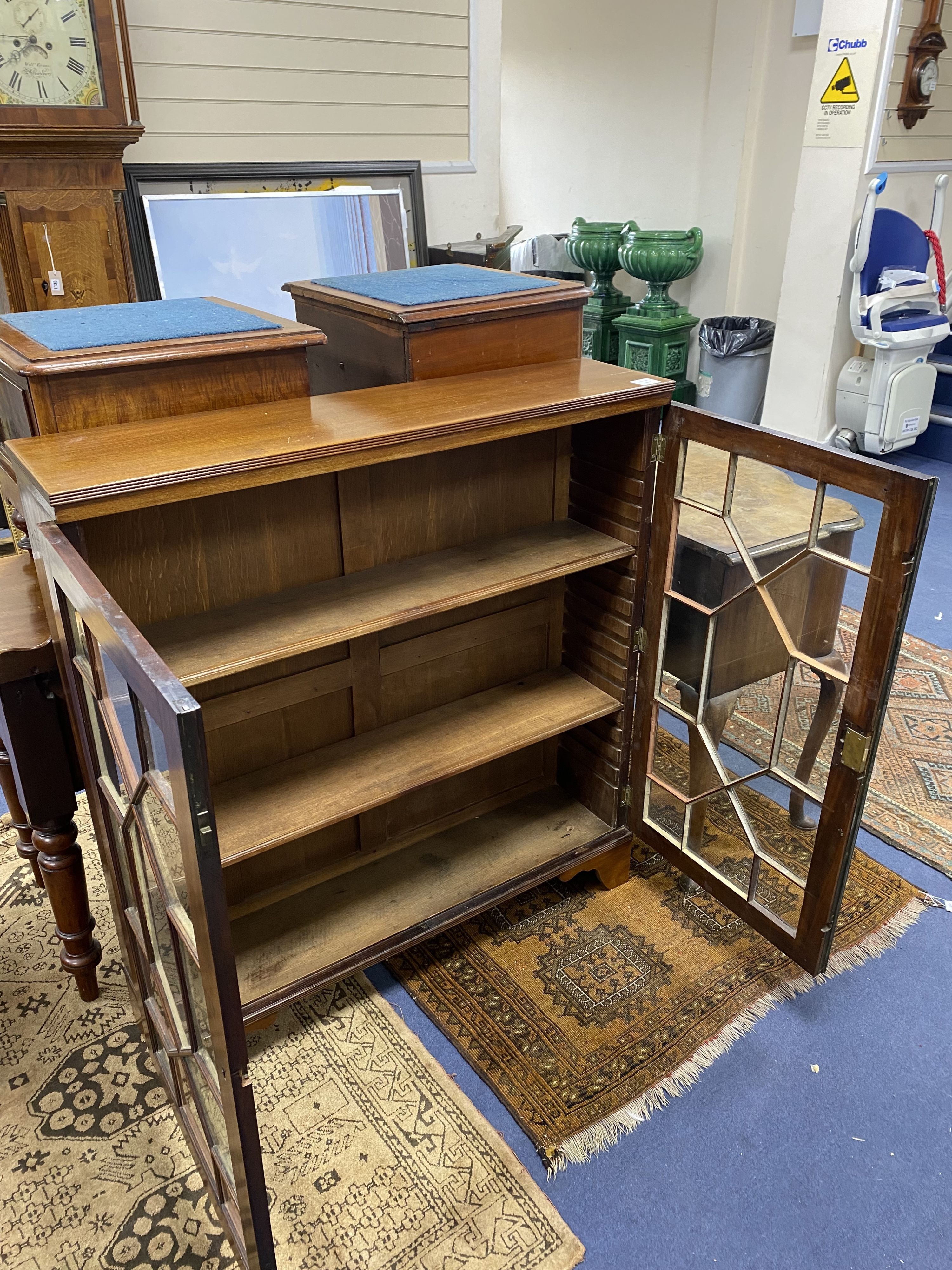 A George III style mahogany two door glazed cabinet, width 86cm, height 113cm